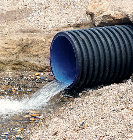 Water flowing through Double Walled Corrugated PE drainage